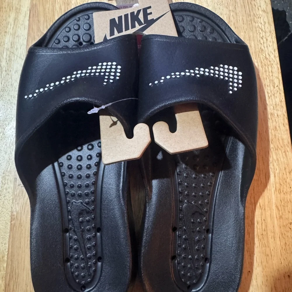 Nike Black Slide Sandals with White Swoosh Accent - Picture 1 of 4